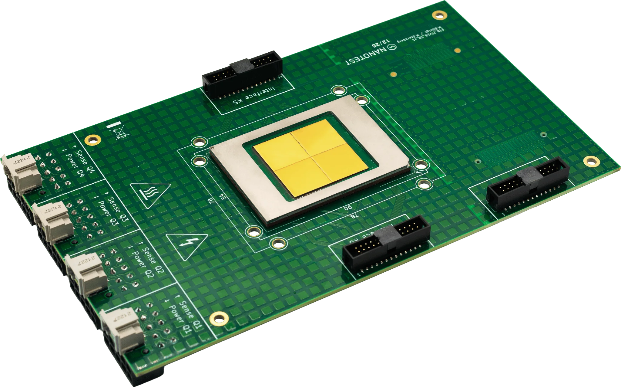 Green circuit board with a central chip having four yellow segments and multiple connectors.